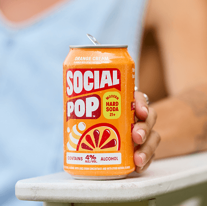 A closeup of a can of Social Pop Orange Cream Hard Soda