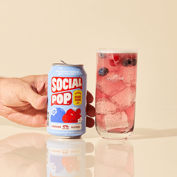 A can and glass of Wildberry Vanilla Social Pop